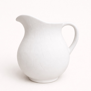 lara ceramic pitcher with subtle carved line texture